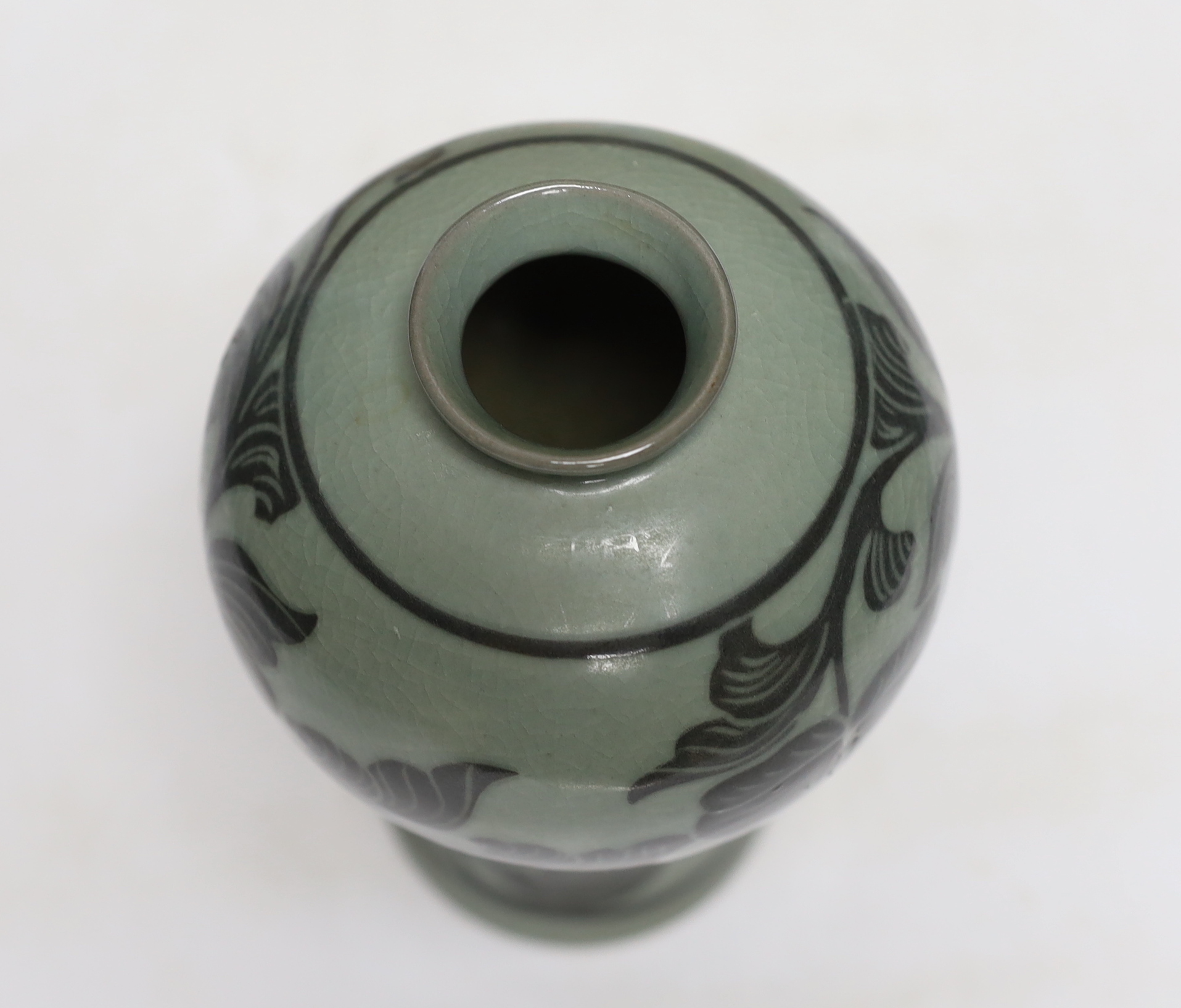 A Chinese millefleur enamelled porcelain dish, six character Qianlong seal mark, but late 19th/early 20th century, 38cm diameter and a Korean celadon vase